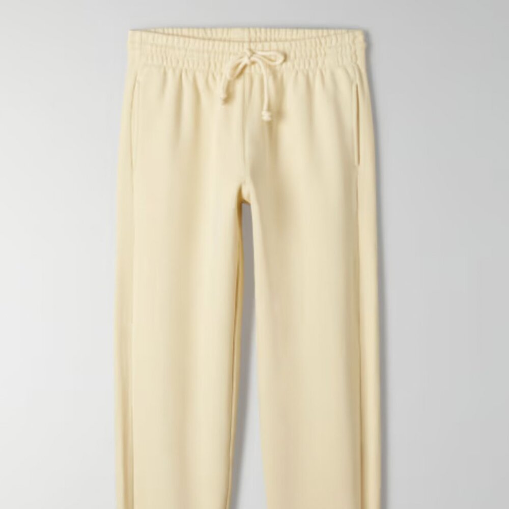 TNA Aritzia COZY FLEECE BOYFRIEND SWEATPANT (light yellow)
